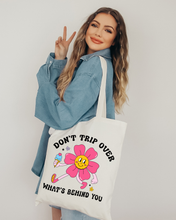 Load image into Gallery viewer, Don’t Trip Over What’s Behind You Canvas Tote Bag, Retro: Natural / One size
